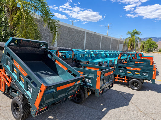 Rows of LLAMA Electric Utility Trikes and cargo beds in stock ahead of Black Friday