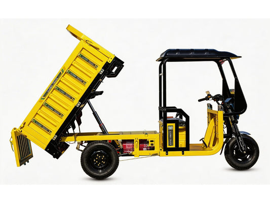 LLAMA Truck Blaze electric cargo trike with its dump bed tipped for unloading
