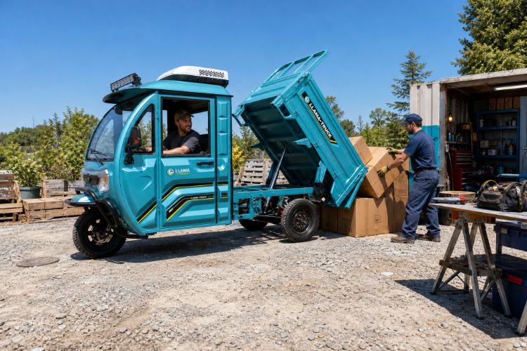 Enclosed cargo trike with a raised bed outside a workshop
