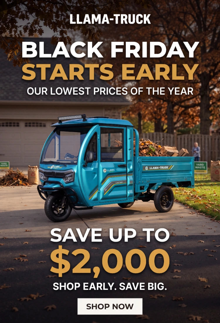 Vertical early Black Friday ad featuring an enclosed teal Llama Truck electric three-wheel mini dump truck carrying fall leaves, with a Shop Now button and $2,000 savings.